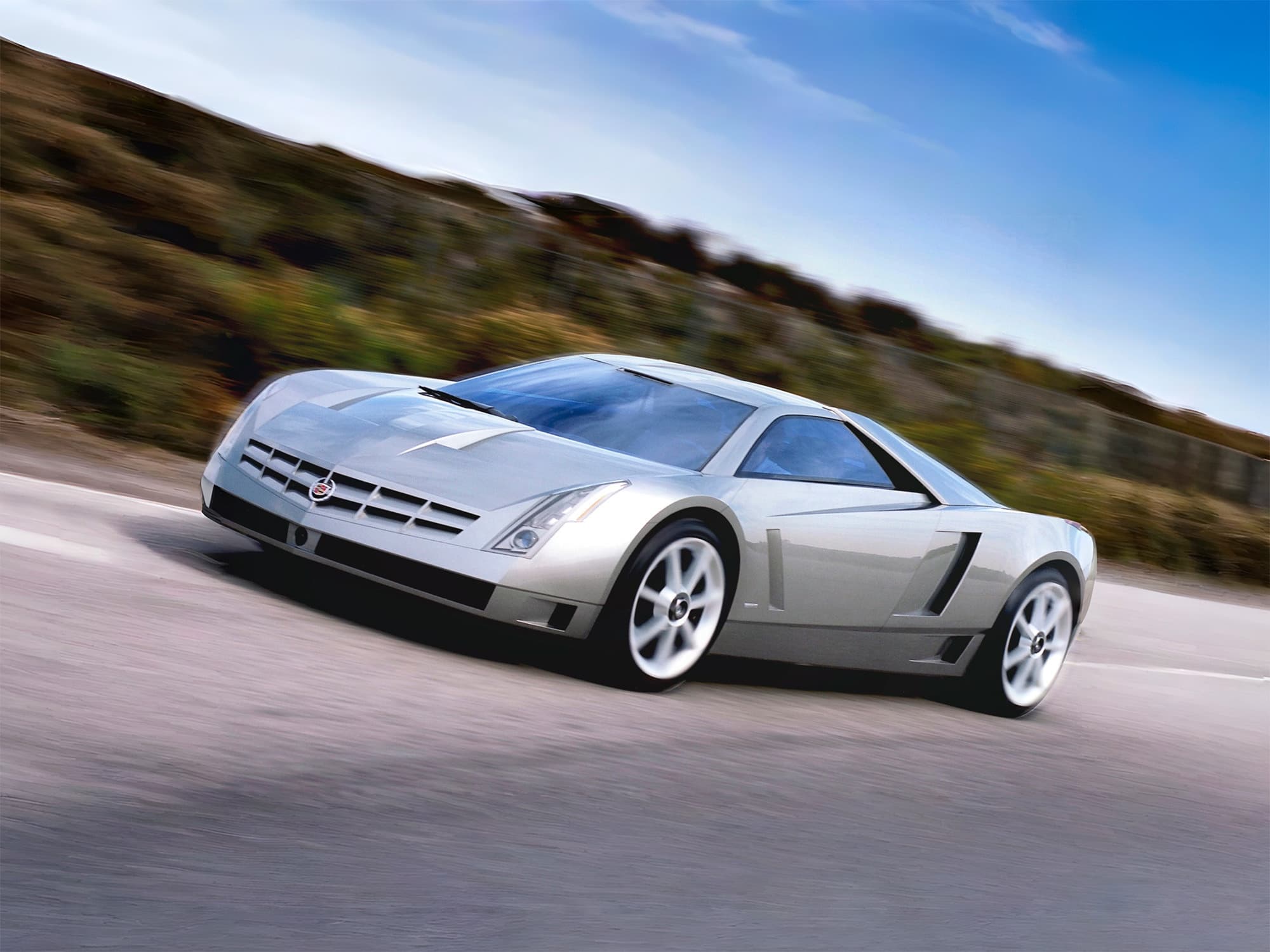 Фото статьи о Cadillac Cien 2002 года: V12, двери-гильотины и суперкар за пределами конвейера — что вышло